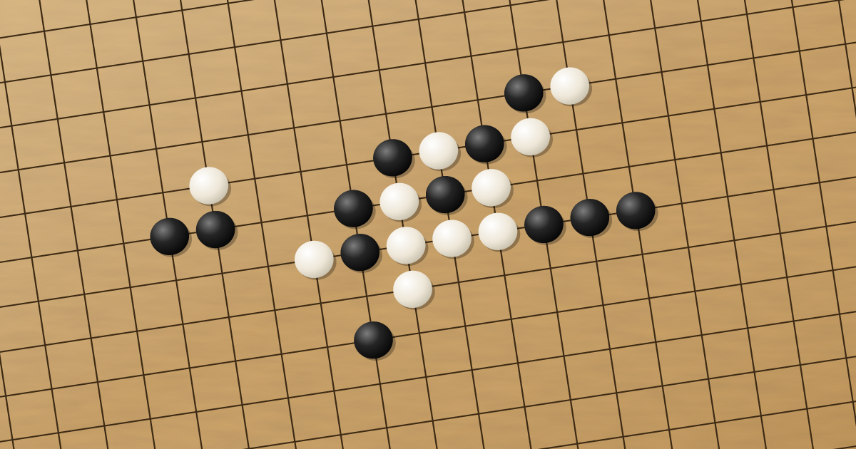 Gomoku board with black and white stones in the middle of a game
